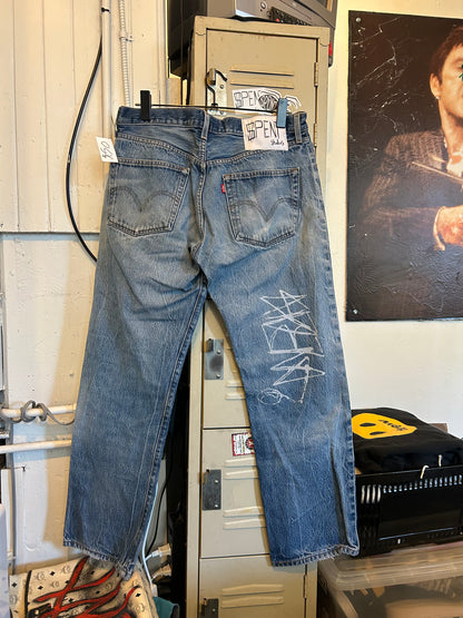 Distressed $pent Signature jeans