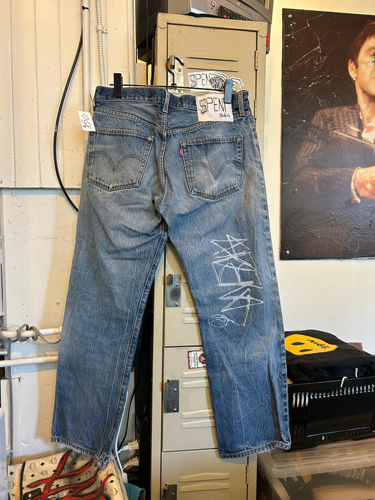 Distressed $pent Signature jeans