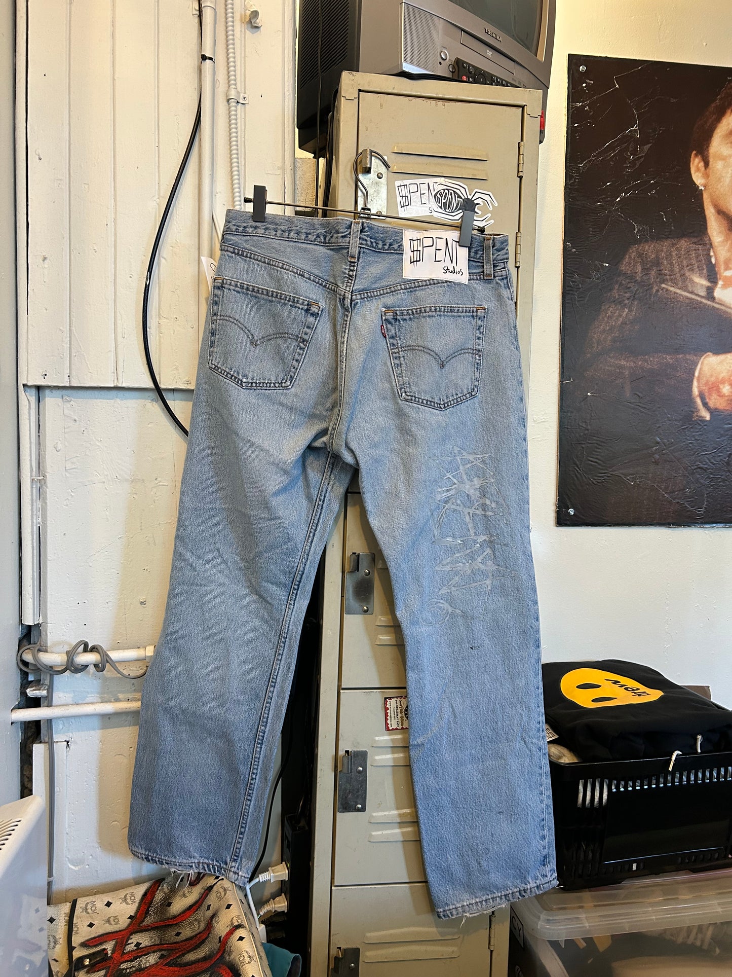 Distressed $pent Signature jeans