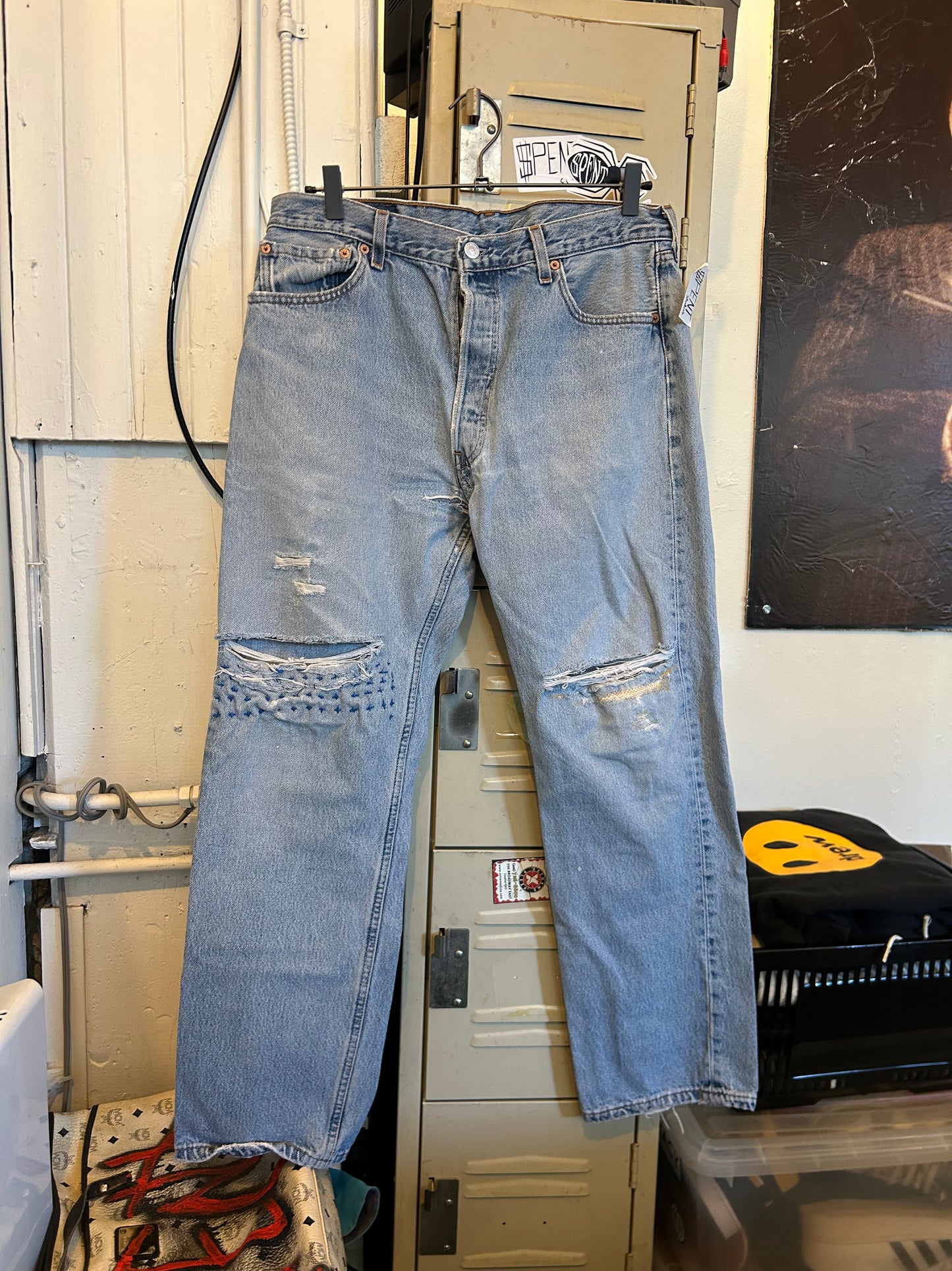 Distressed $pent Signature jeans
