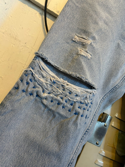 Distressed $pent Signature jeans
