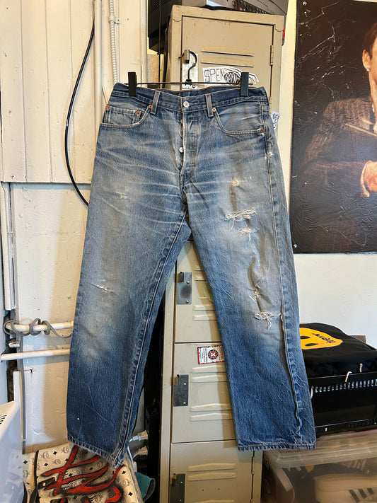 Distressed $pent Signature jeans