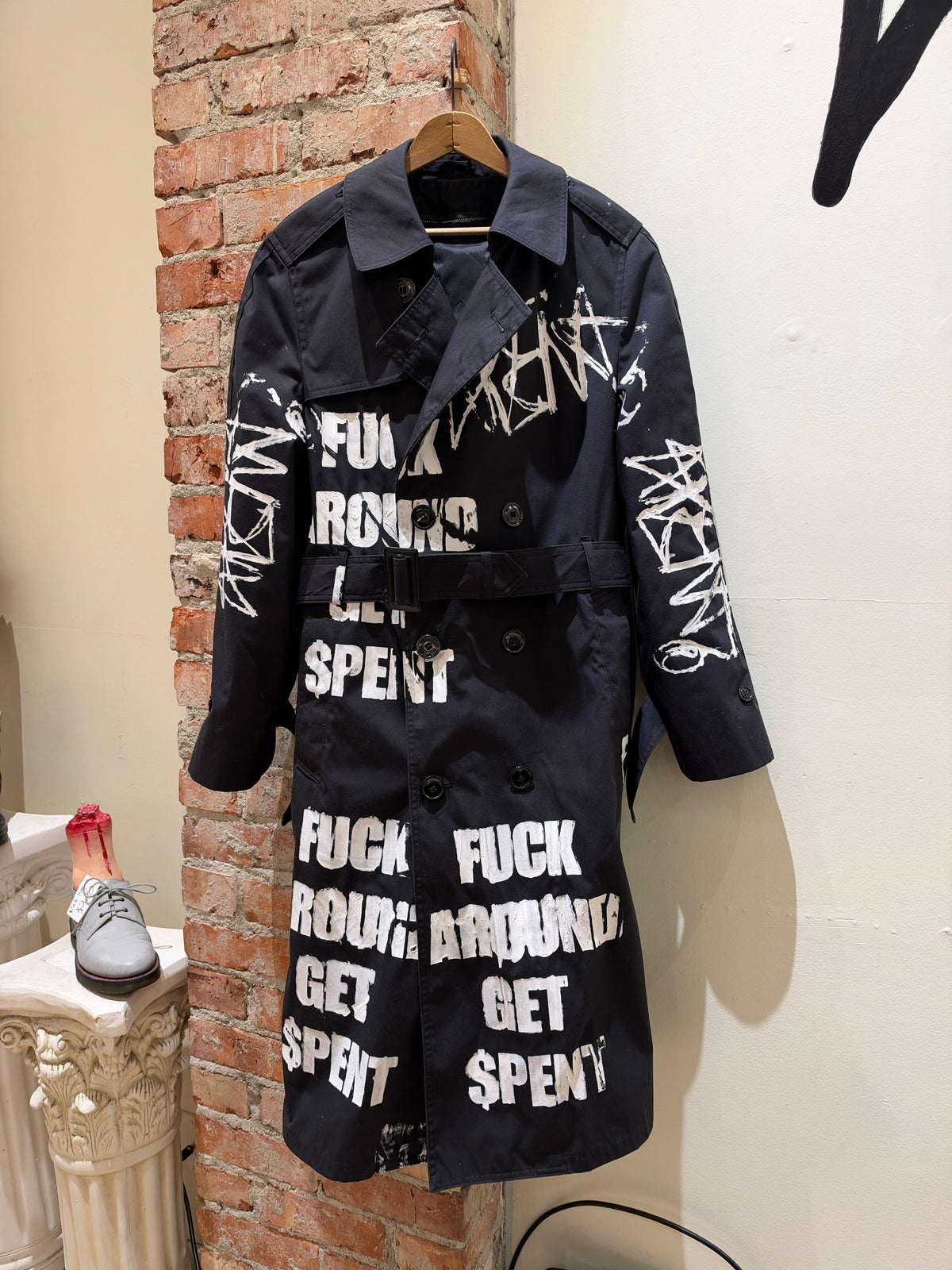 Get $pent Trench coat